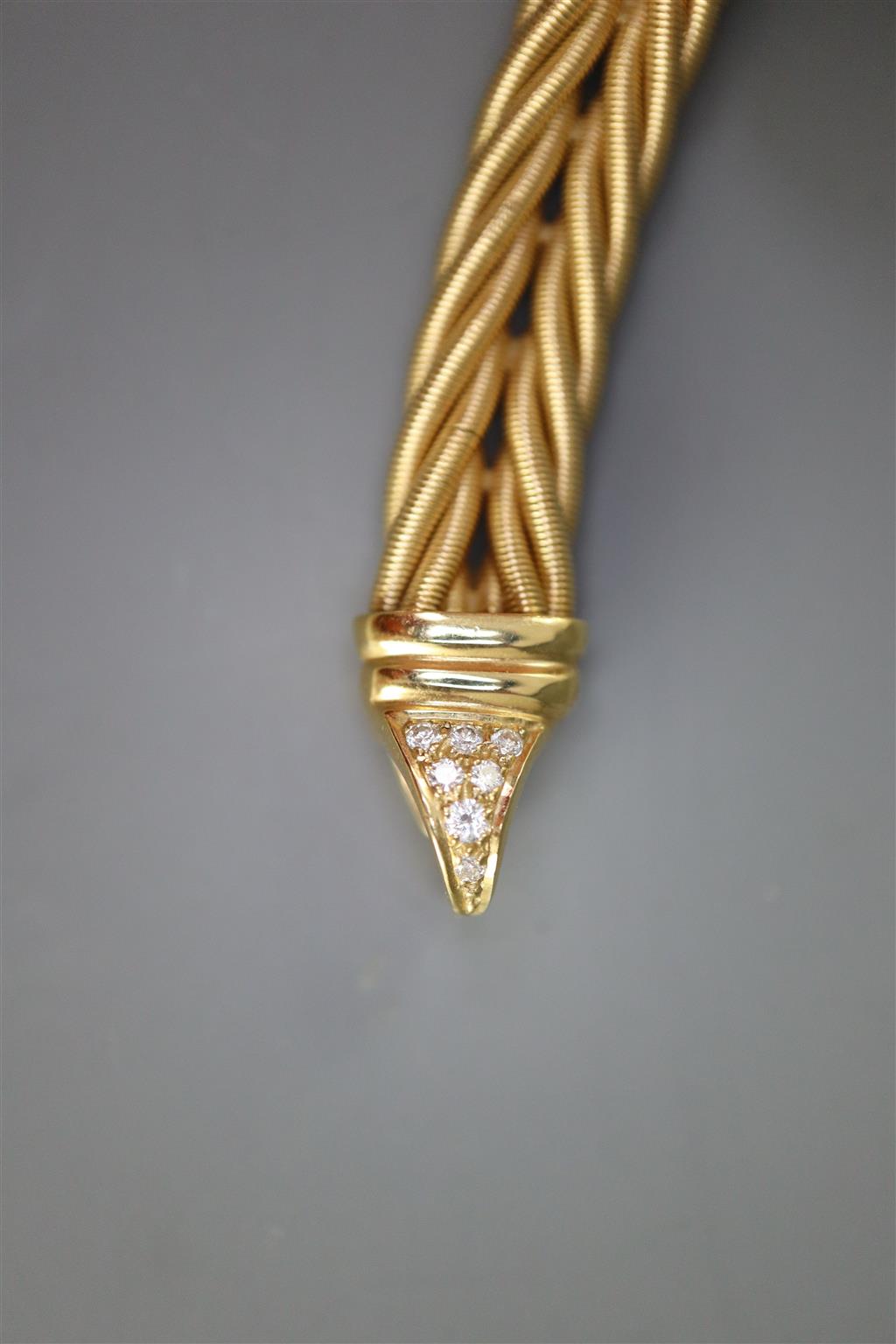 A Wellendorf 18ct. gold cable twist link bracelet with diamond set clasp,